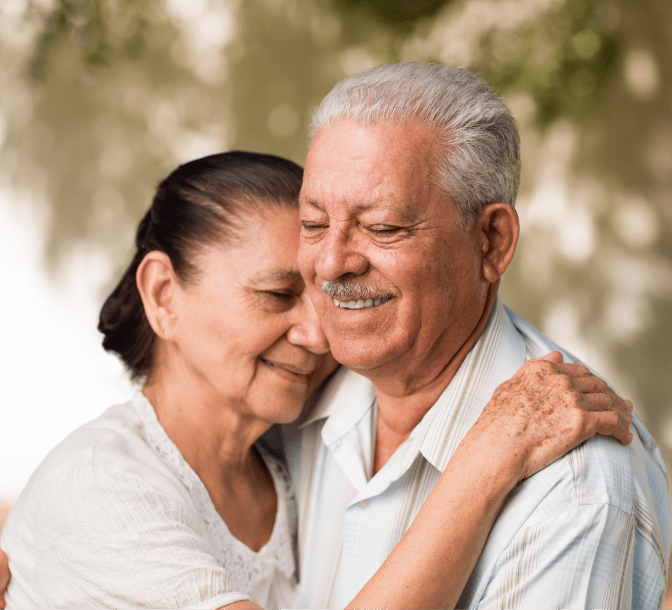 man and woman hugging