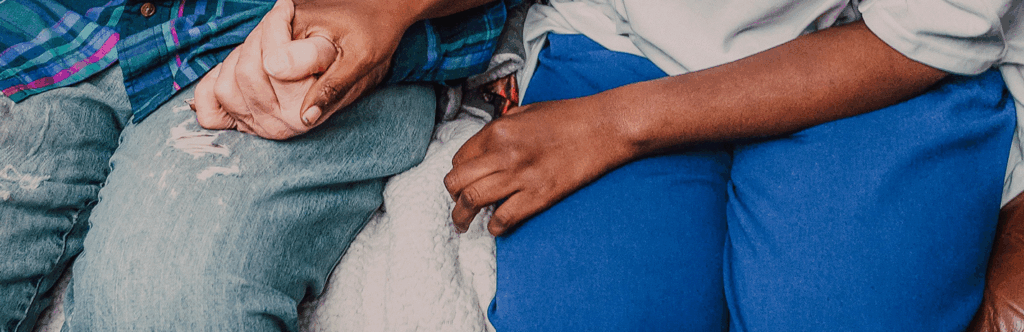 two people holding hands